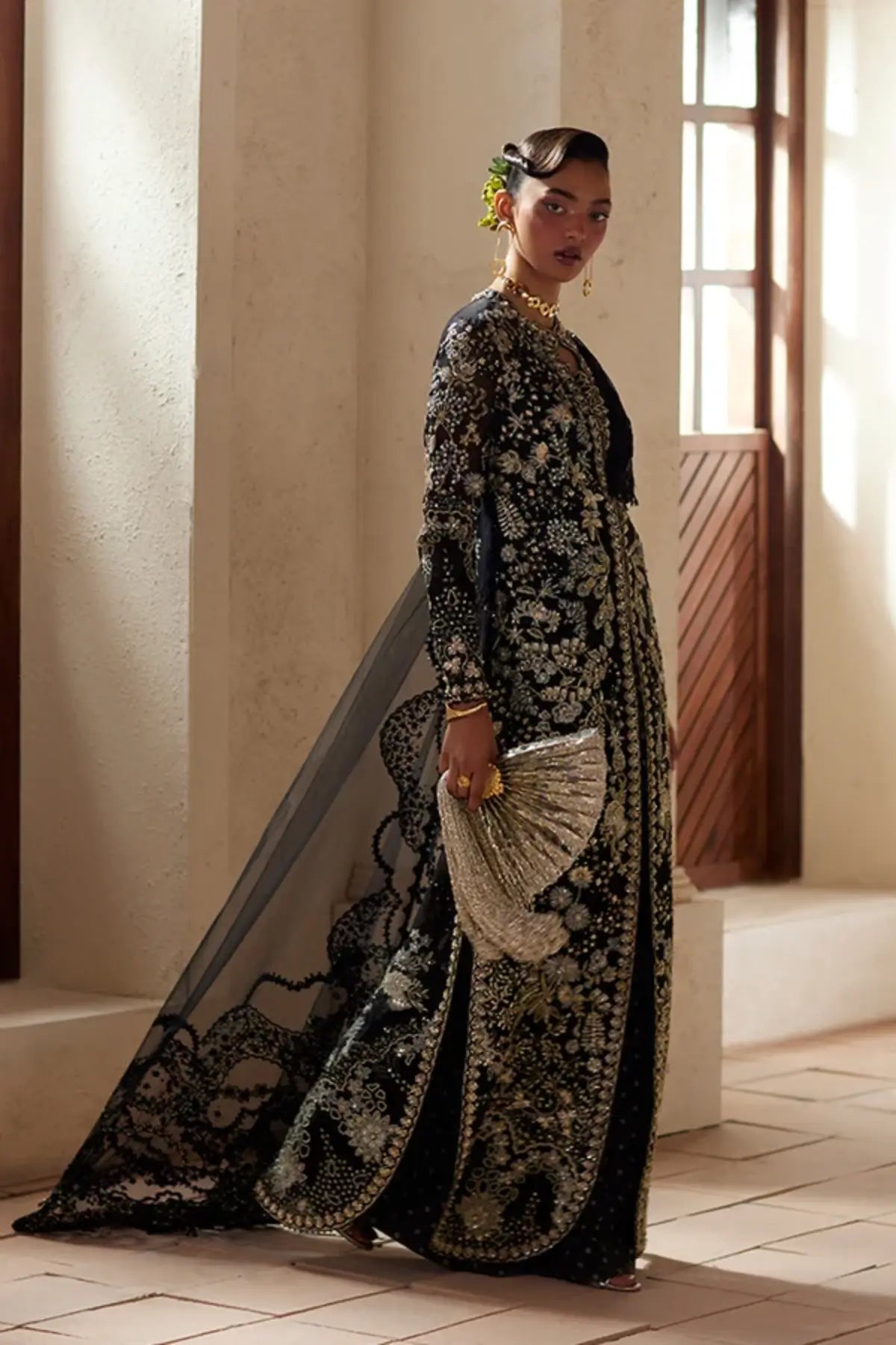 Avinaa black embroidered organza wedding formal gown with blue grey embroidery, gold embellishments, net drape and raw silk trousers