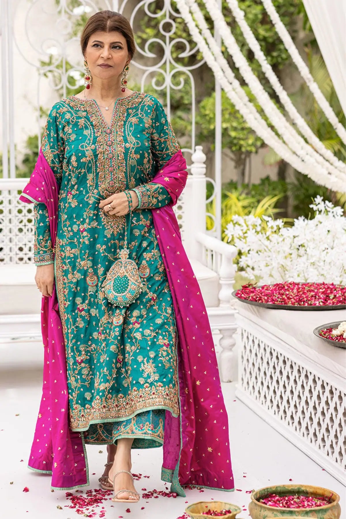 Avisa emerald green stitched wedding outfit with raw silk kurta, hand embellishment and izaar pants at Pakistanimoda