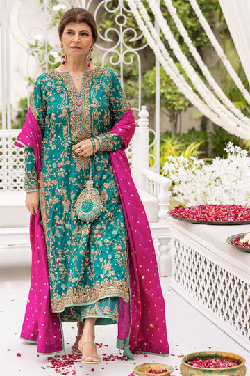 Avisa emerald green stitched wedding outfit with raw silk kurta, hand embellishment and izaar pants at Pakistanimoda