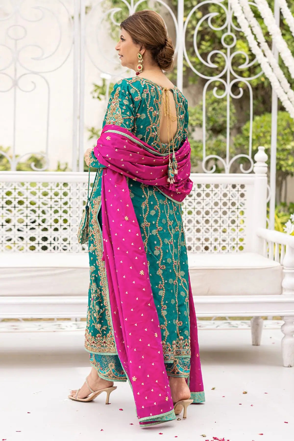 Avisa emerald green stitched wedding outfit with raw silk kurta, hand embellishment and izaar pants at Pakistanimoda