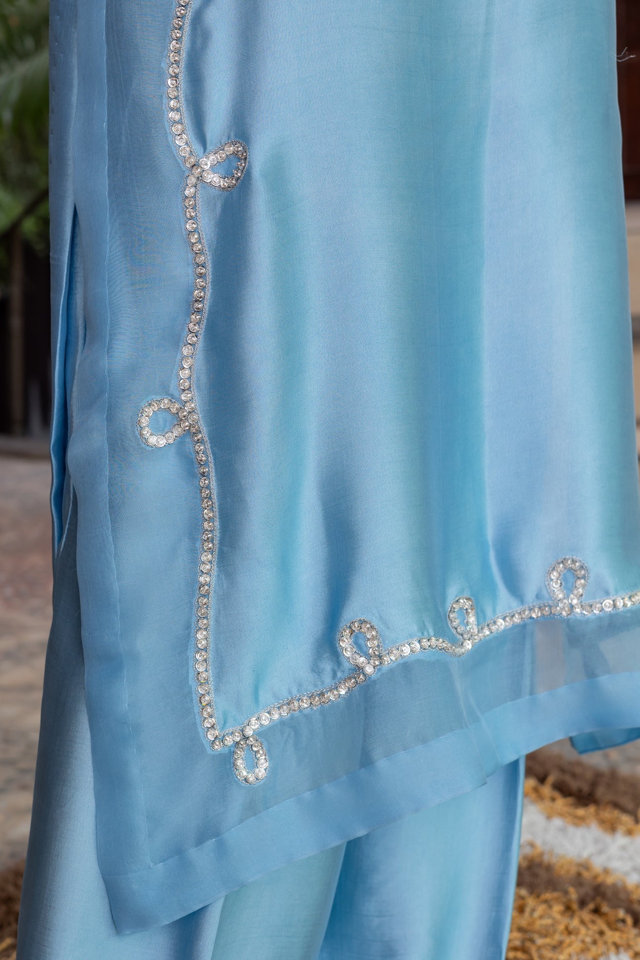 Sky blue Pakistani sheesha silk suit with vertical neckline embroidery, sleeve and side panel work, and pearl-detailed organza dupatta by MariamRaj for festive wear in the USA.