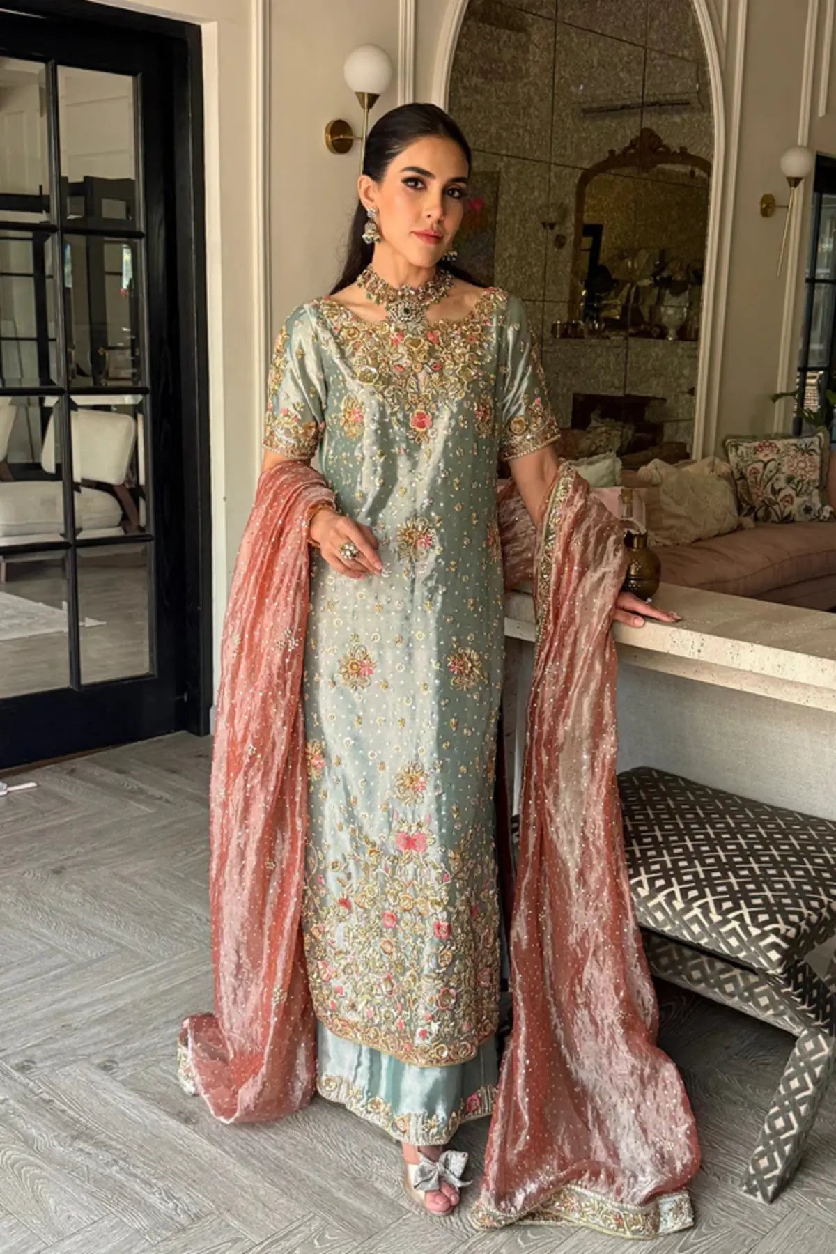 Ayeza blue tissue lameh stitched formal dress with handcrafted zardozi embroidery and elegant peach dupatta.