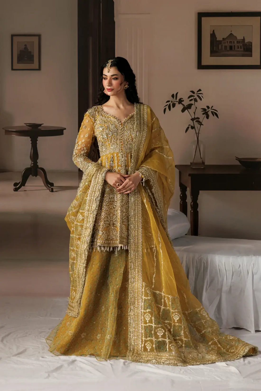 Aylin golden embroidered organza stitched wedding sharara suit with intricate silver detailing and embellished organza dupatta