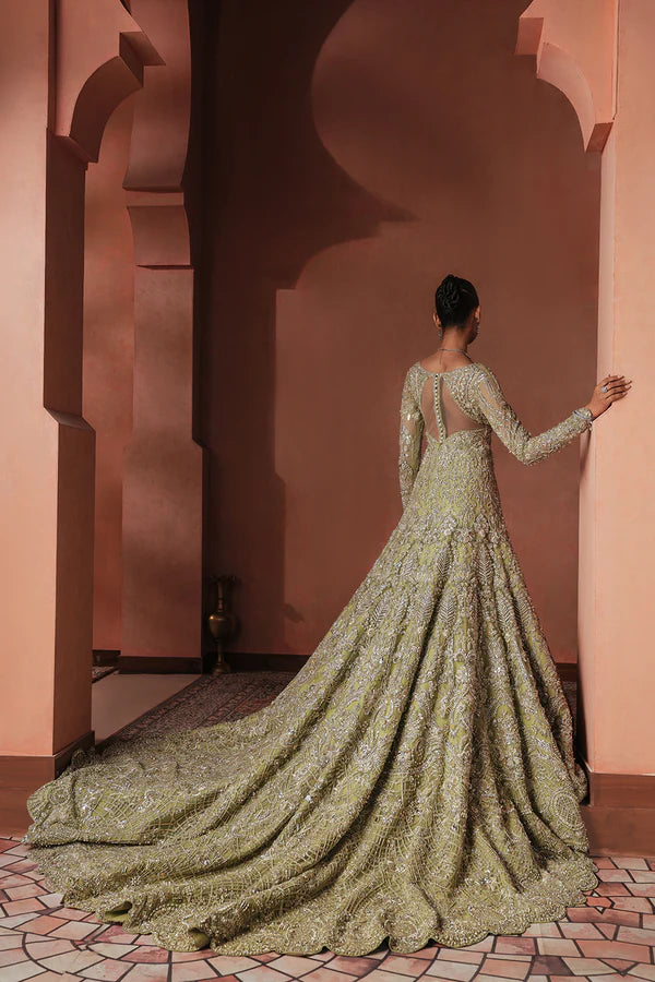Sage green Pakistani bridal trail gown for USA brides in soft net, hand-embellished with naqshi, dabka, mirror work, mukesh, cutwork, and 3D detailing for a graceful wedding look.