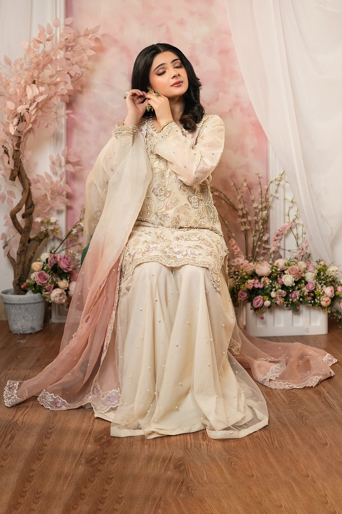 Ayzel ivory organza shirt with pearl net sharara and peach embroidered dupatta by MariamRaj