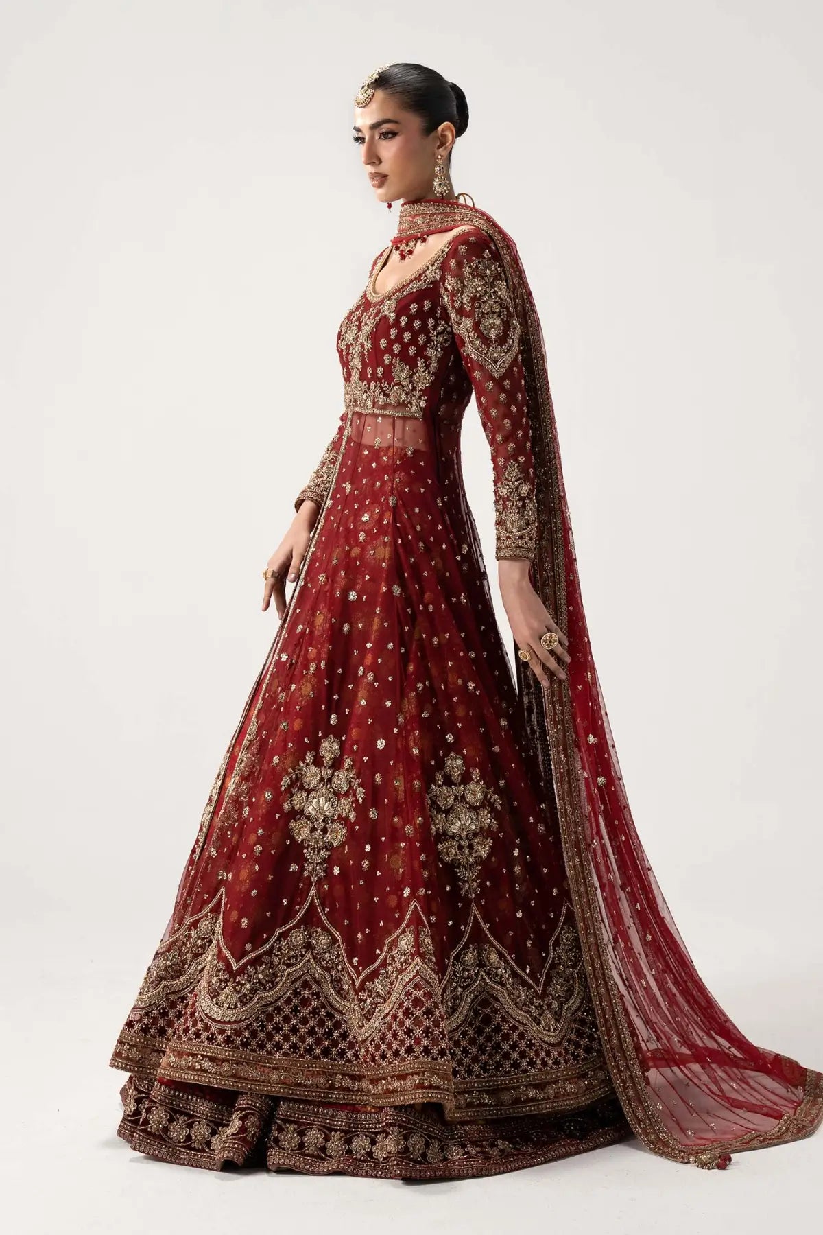 Bazif deep red royal bridal pishwas lehenga set with jamawar lehenga and net dupatta by Maria B