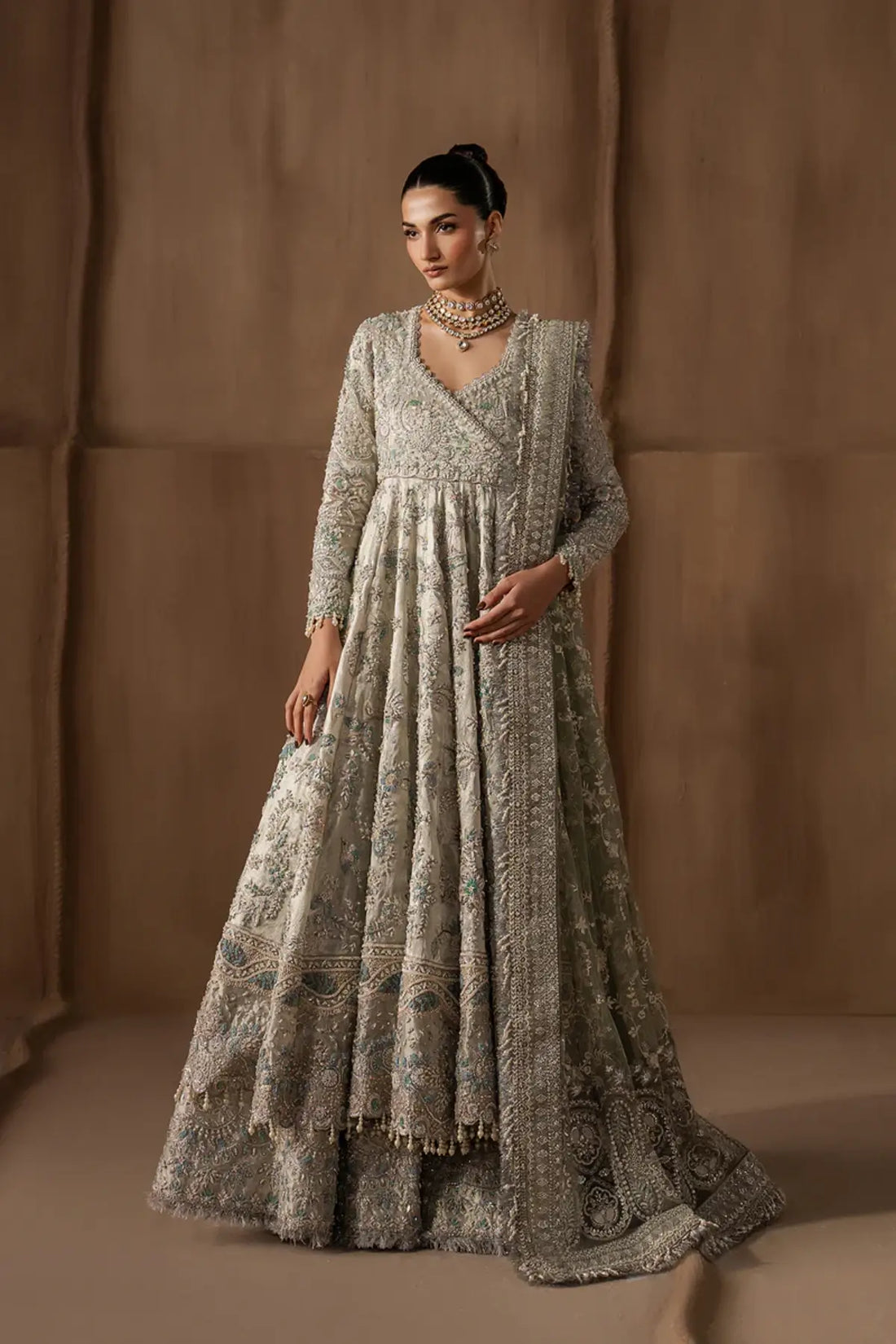 Beactrice by Afrozeh silver mint stitched angrakha pishwas with tissue zari and net dupatta