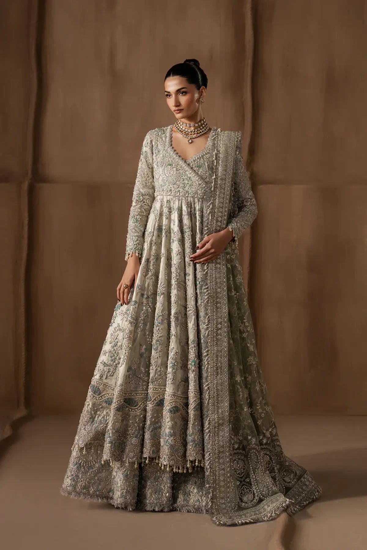 Beactrice by Afrozeh silver mint stitched angrakha pishwas with tissue zari and net dupatta
