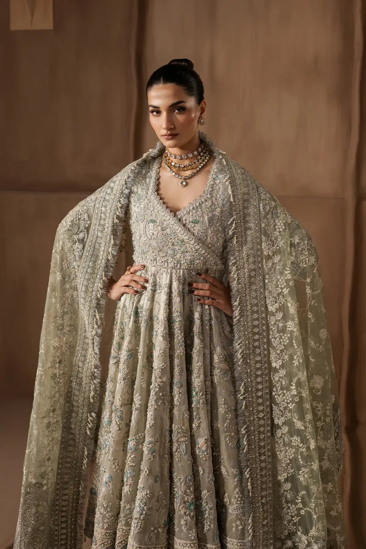 Beactrice by Afrozeh silver mint stitched angrakha pishwas with tissue zari and net dupatta