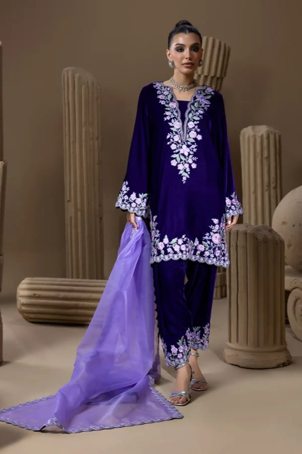 Benafsha deep purple velvet shalwar kameez with pastel floral resham embroidery, matching velvet shalwar and lavender organza dupatta.