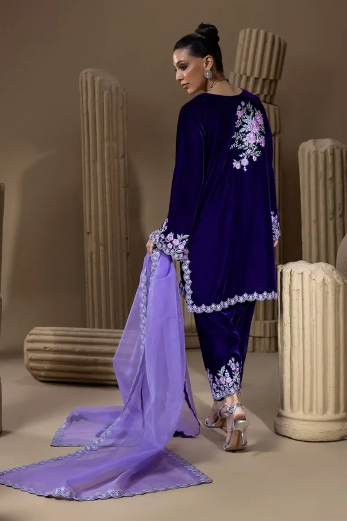 Benafsha deep purple velvet shalwar kameez with pastel floral resham embroidery, matching velvet shalwar and lavender organza dupatta. 