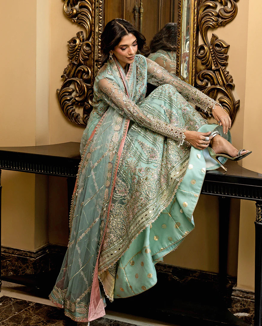 Bindu mint green stitched formal set with sheer yoke, net panels and sequined dupatta from Mushq Darlings Wedding Collection at Pakistanimoda.