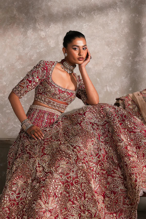 Luxury Pakistani bridal ensemble for Canadian brides in gold silk tissue and organza, hand-embellished with zari, naqshi, dabka, mirror work, mukesh, cutwork, and 3D detailing.
