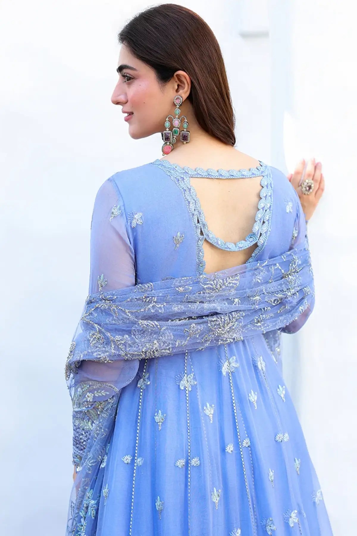 Blushing Bride blue hand embellished embroidered chiffon stitched formal suit with sequinned net dupatta and raw silk trouser