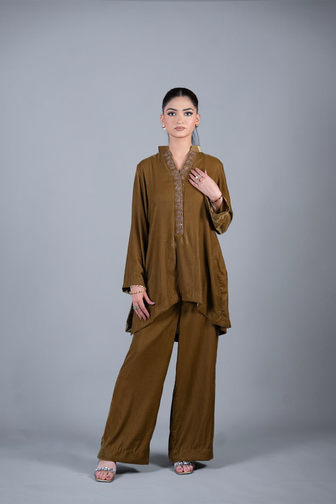 Bronze Muse mustard pure velvet co-ord set with embroidered neckline and high-low top by MariamRaj