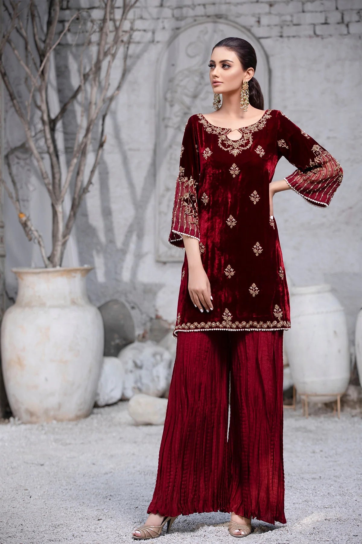 Maroon velvet shirt with dabka, cora, and pearl work, paired with crushed silk pants and matching organza dupatta – ideal for formal wear 2025.