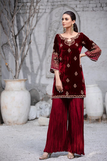 Maroon velvet shirt with dabka, cora, and pearl work, paired with crushed silk pants and matching organza dupatta – ideal for formal wear 2025.