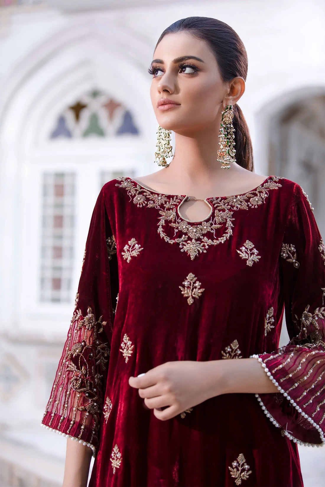 Maroon velvet shirt with dabka, cora, and pearl work, paired with crushed silk pants and matching organza dupatta – ideal for formal wear 2025.