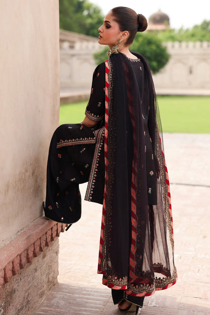 CMA-5-069 black raw silk embroidered Pakistani 3-piece formal suit with tassel neckline, embroidered shalwar, and poly net dupatta – shop online at Pakistanimoda.com.