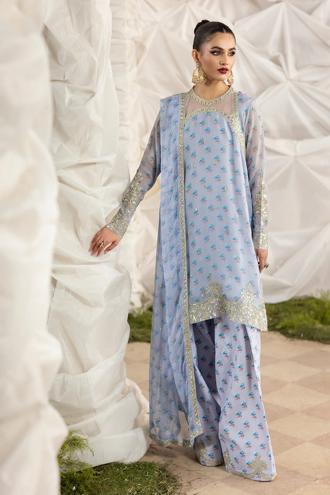 CMA-5-119A Charizma Powder Blue Chiffon 3PC Embroidered Suit – designer outfit with floral embroidery, raw silk trouser & chiffon dupatta. Shop at Pakistanimoda.com.