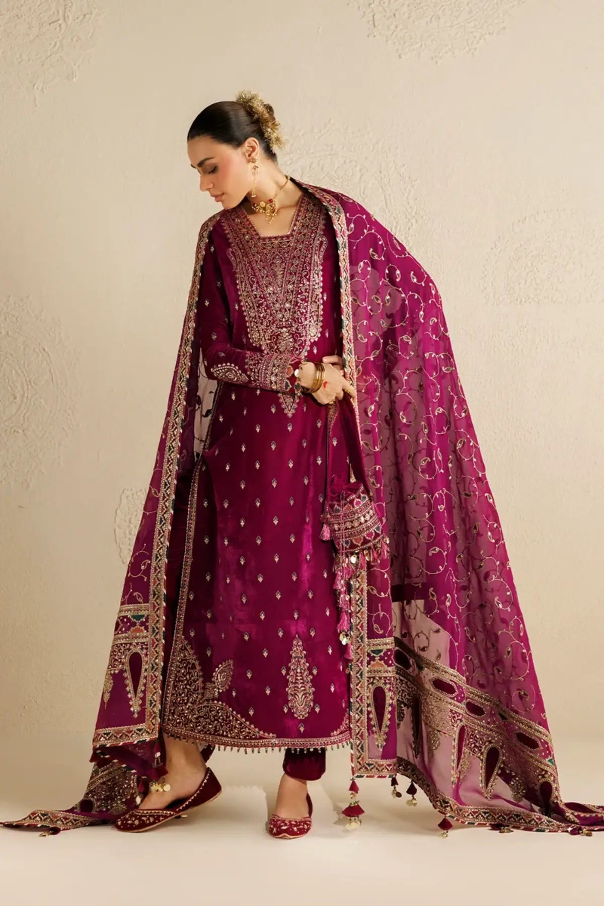 Jazmin CVF26-D12 magenta embroidered velvet stitched Mehndi guest suit with chiffon dupatta and embellished bag