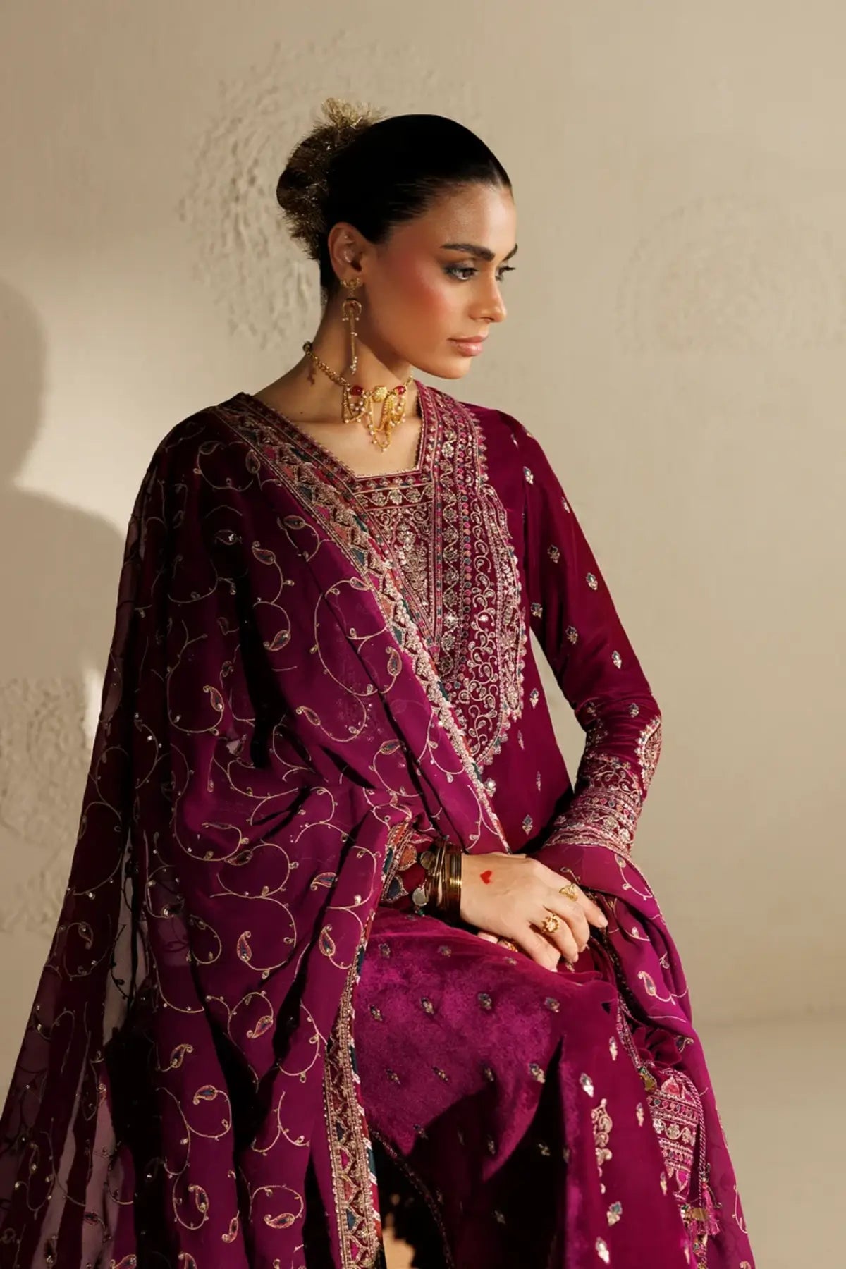Jazmin CVF26-D12 magenta embroidered velvet stitched Mehndi guest suit with chiffon dupatta and embellished bag