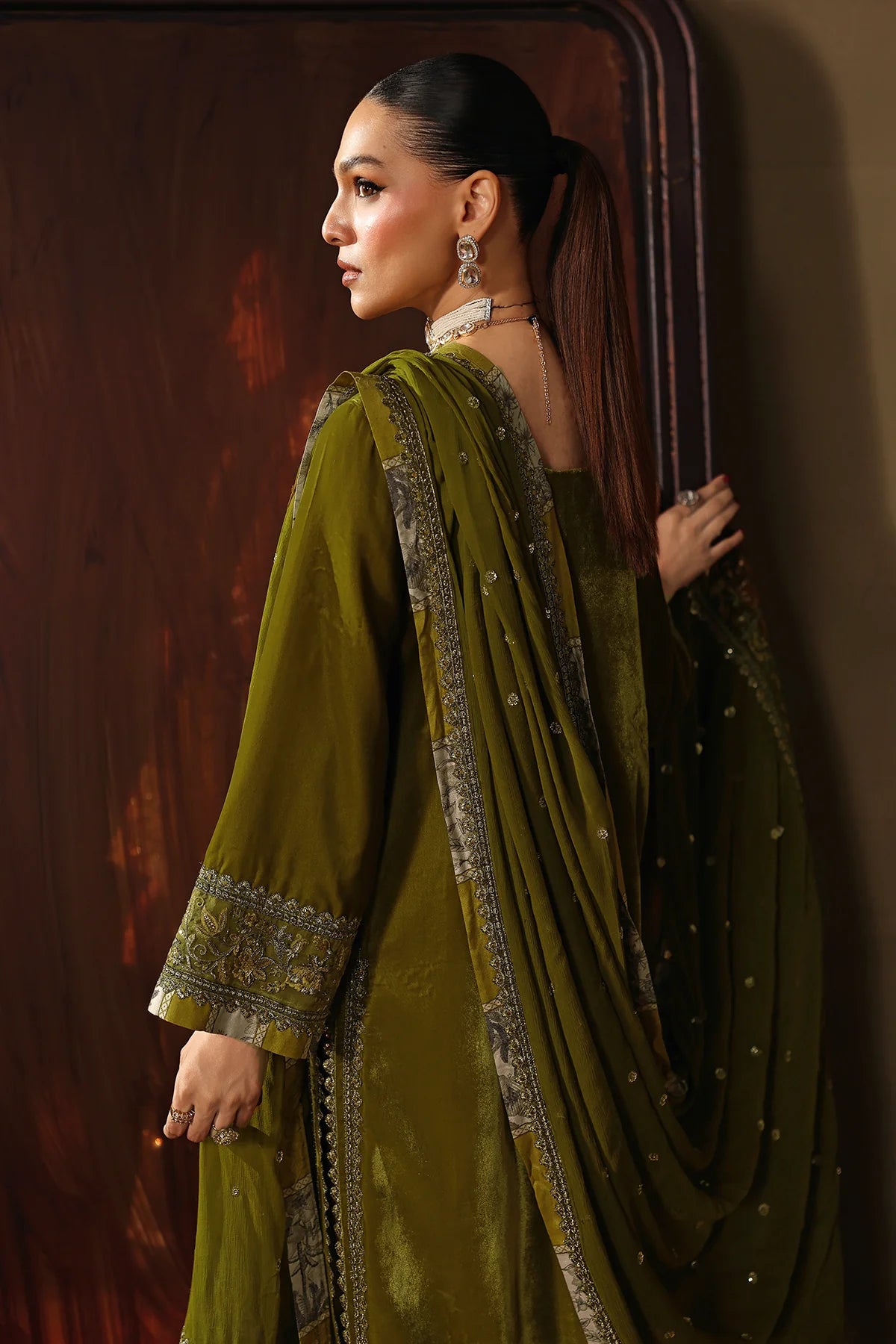 Charizma Signora CVT5-02 olive velvet 3-piece suit with embroidered dyed chiffon dupatta and intricate hand embroidery, available online at Pakistanimoda.