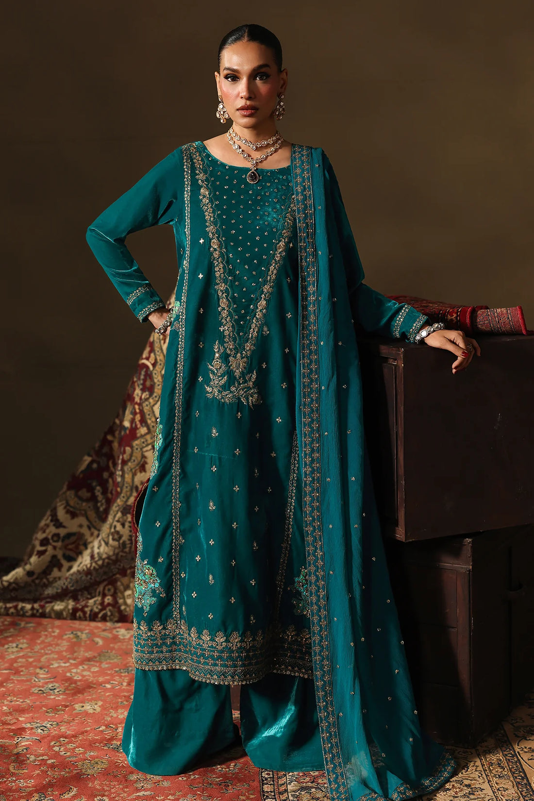 Charizma Signora CVT5-07 teal velvet 3-piece suit with embroidered dyed chiffon dupatta and intricate hand embroidery, available at Pakistanimoda.
