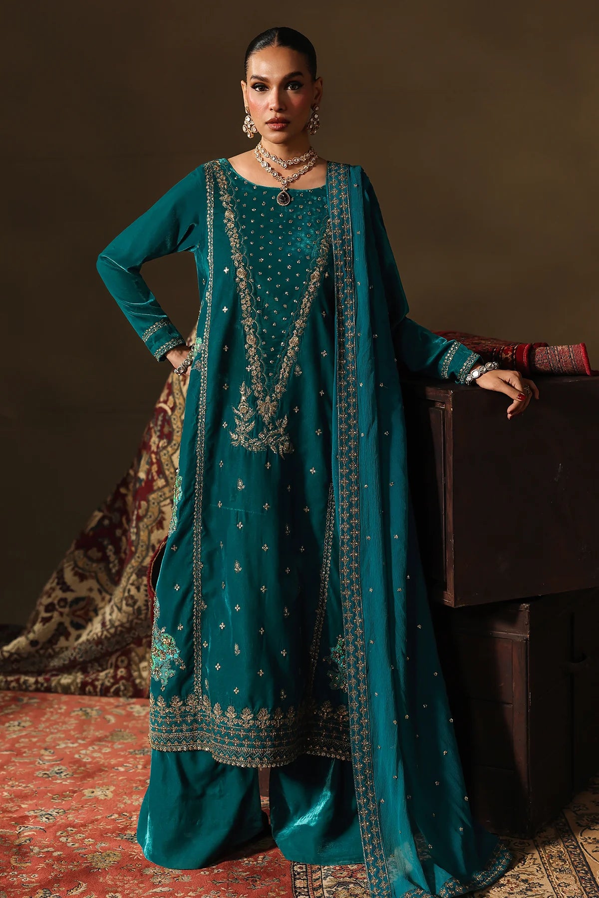 Charizma Signora CVT5-07 teal velvet 3-piece suit with embroidered dyed chiffon dupatta and intricate hand embroidery, available at Pakistanimoda.