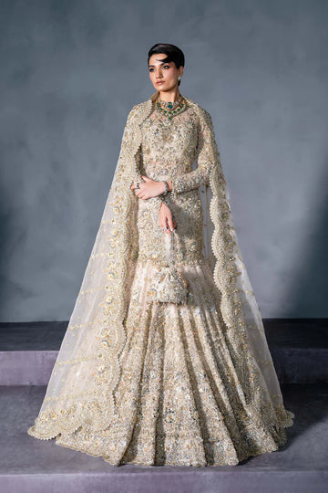 Luxury gold Pakistani bridal lehenga with hand embroidery, crystals, full sleeves, scalloped dupatta, and pouch – perfect for brides in USA, UK, Canada, and UAE.