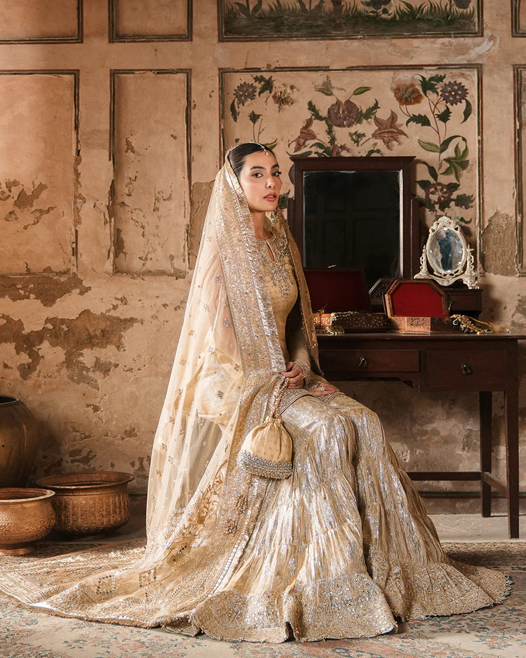 Camillie- Embroidered Gold Zari Net Gharara Suit For Festive Occasions