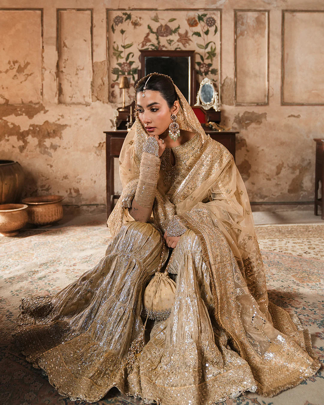 Camillie- Embroidered Gold Zari Net Gharara Suit For Festive Occasions