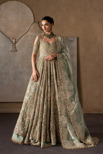 Catarine by Afrozeh champagne stitched organza bridal lehenga with heavy gold embroidery luxury Pakistani wedding wear