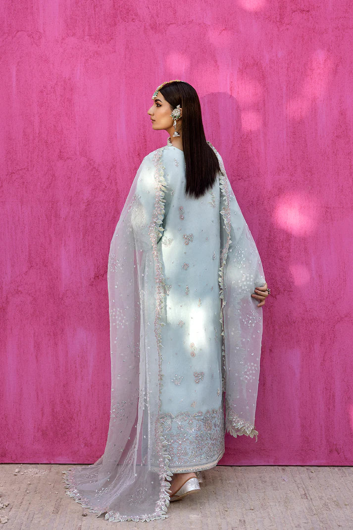 Cealina stylish ice blue organza embroidered suit with raw silk trouser and organza dupatta by Emaan Adeel, luxury pret wear for wedding guests.