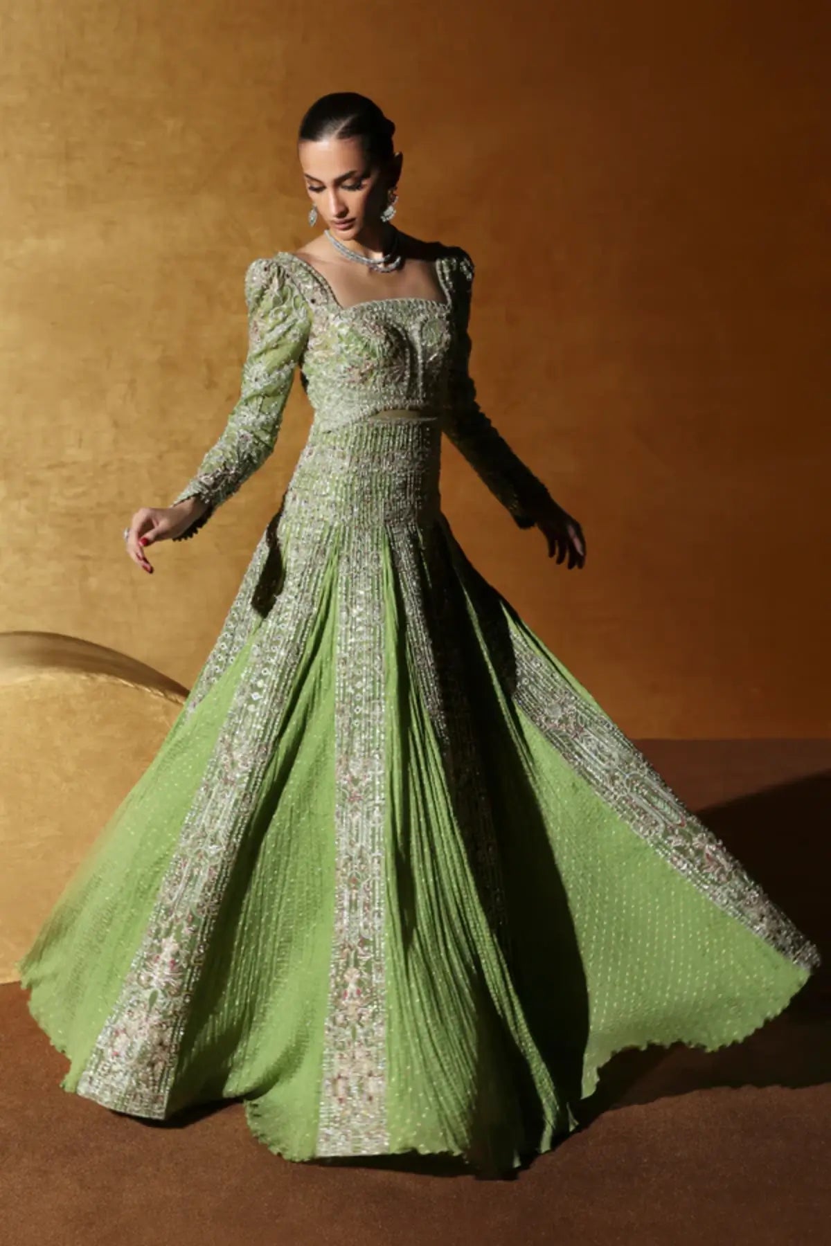 Celvère by Soraya Oriana Luxury Formals '26 moss green luxury formal dress with elegant crushed panels