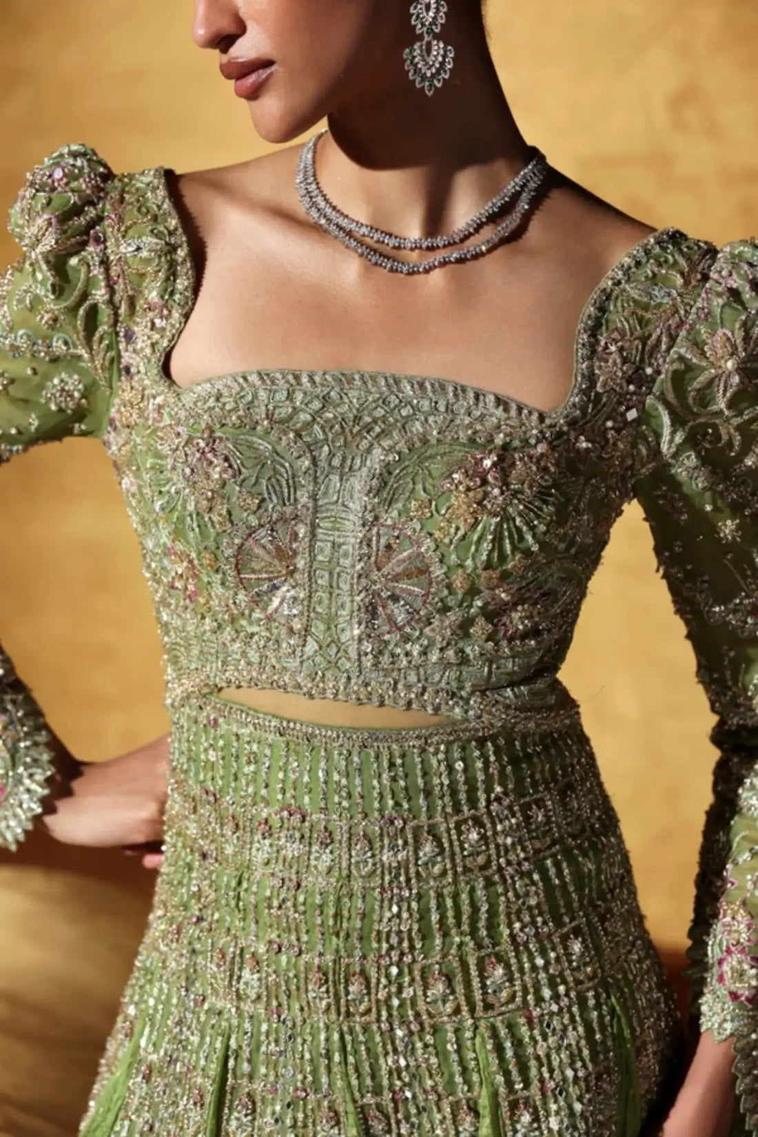 Celvère by Soraya Oriana Luxury Formals '26 moss green luxury formal dress with elegant crushed panels
