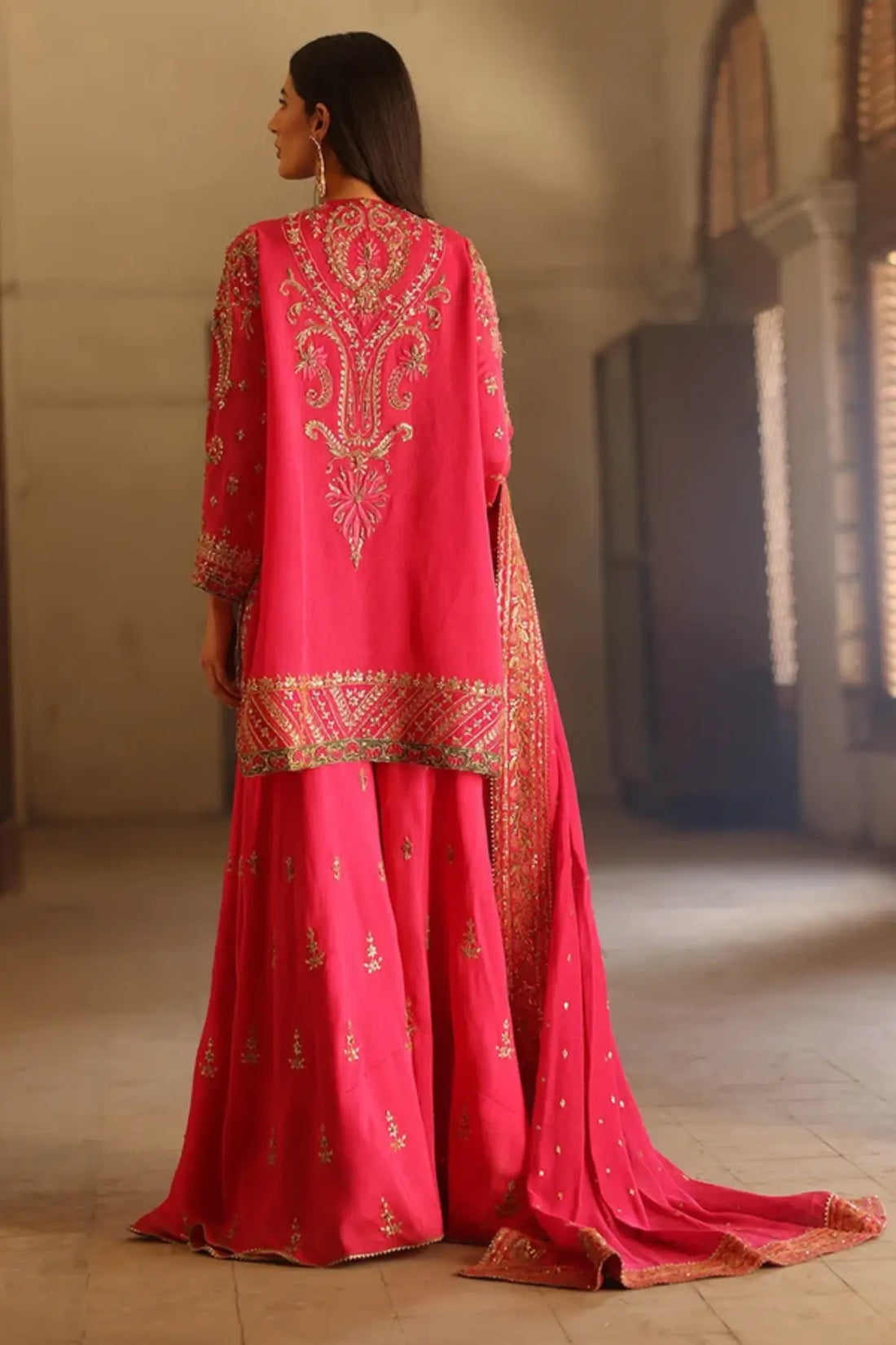 Chandni Fuchsia Pink Handworked Silk Net Sangeet Shirt with Gold Zardozi Detailing, Raw Silk Dhaka Pants and Embellished Net Dupatta