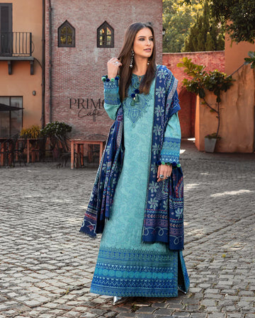 Model wearing Mushq Chianti Glow aqua jacquard embroidered winter suit with matching shawl – Winter Broadway 2025