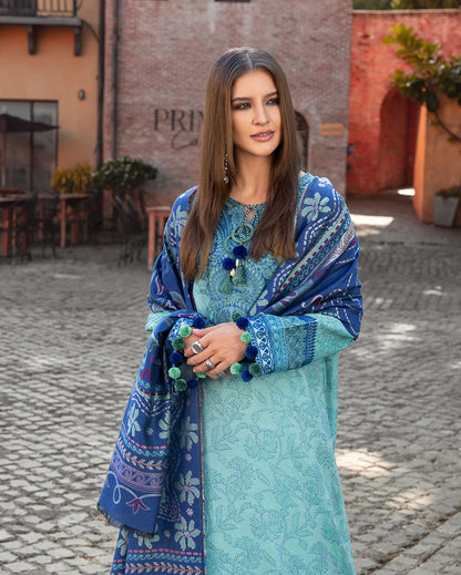Model wearing Mushq Chianti Glow aqua jacquard embroidered winter suit with matching shawl – Winter Broadway 2025