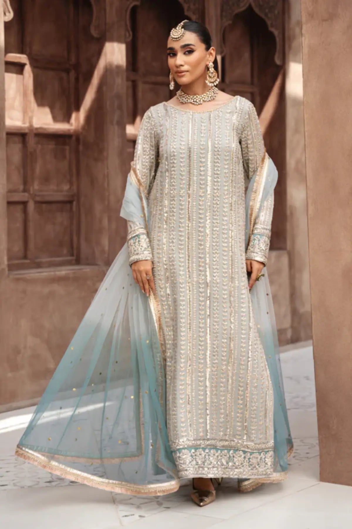 Darcel frost blue embroidered chiffon kurta set with net dupatta and raw silk trouser for festive wear