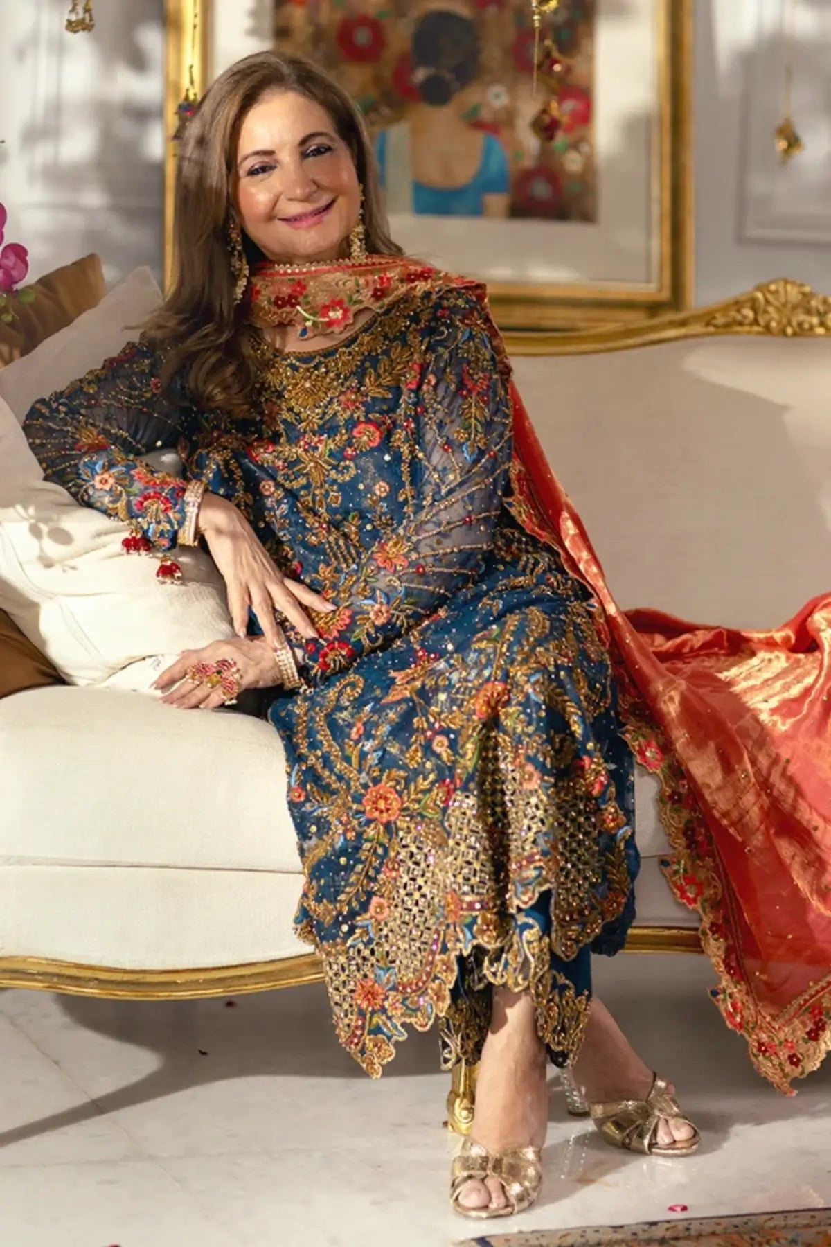 Daria Navy Blue Embroidered Net Wedding Guest Shirt with Gold Multicolor Floral Detailing, Cotton Silk Pants and Orange Lame Dupatta