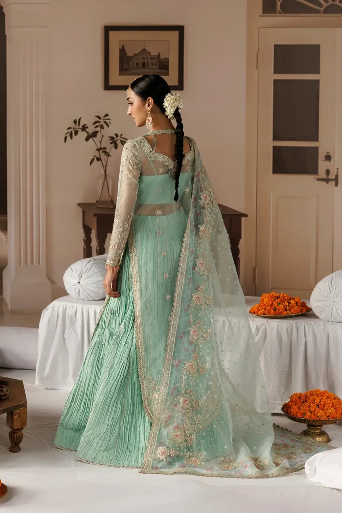 Dastoor aqua embroidered organza stitched wedding suit with floral detailing, raw silk trouser and elegant organza dupatta