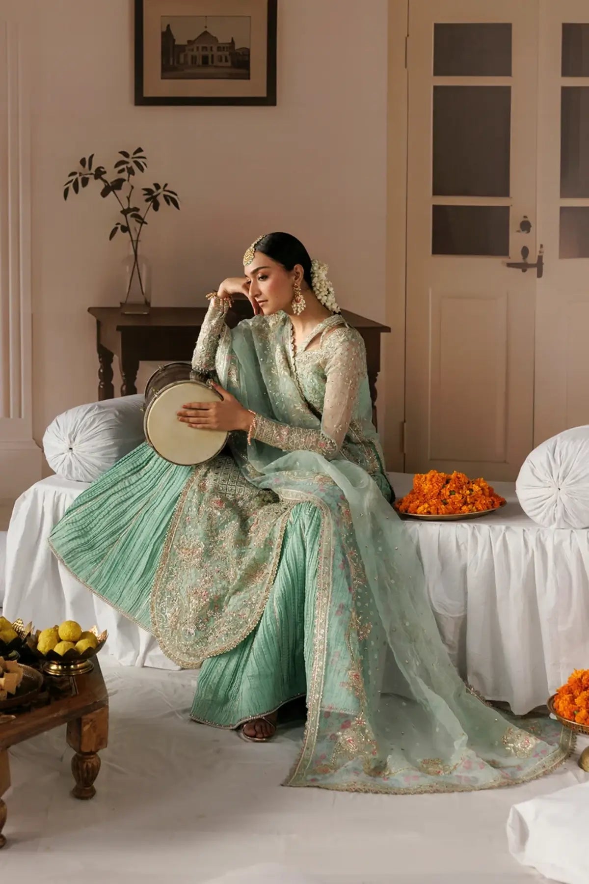 Dastoor aqua embroidered organza stitched wedding suit with floral detailing, raw silk trouser and elegant organza dupatta