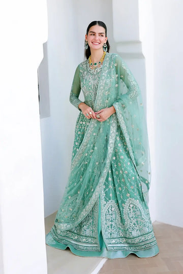 Dazzling Diva mint green hand embellished chiffon stitched suit with sequinned net dupatta and raw silk trouser