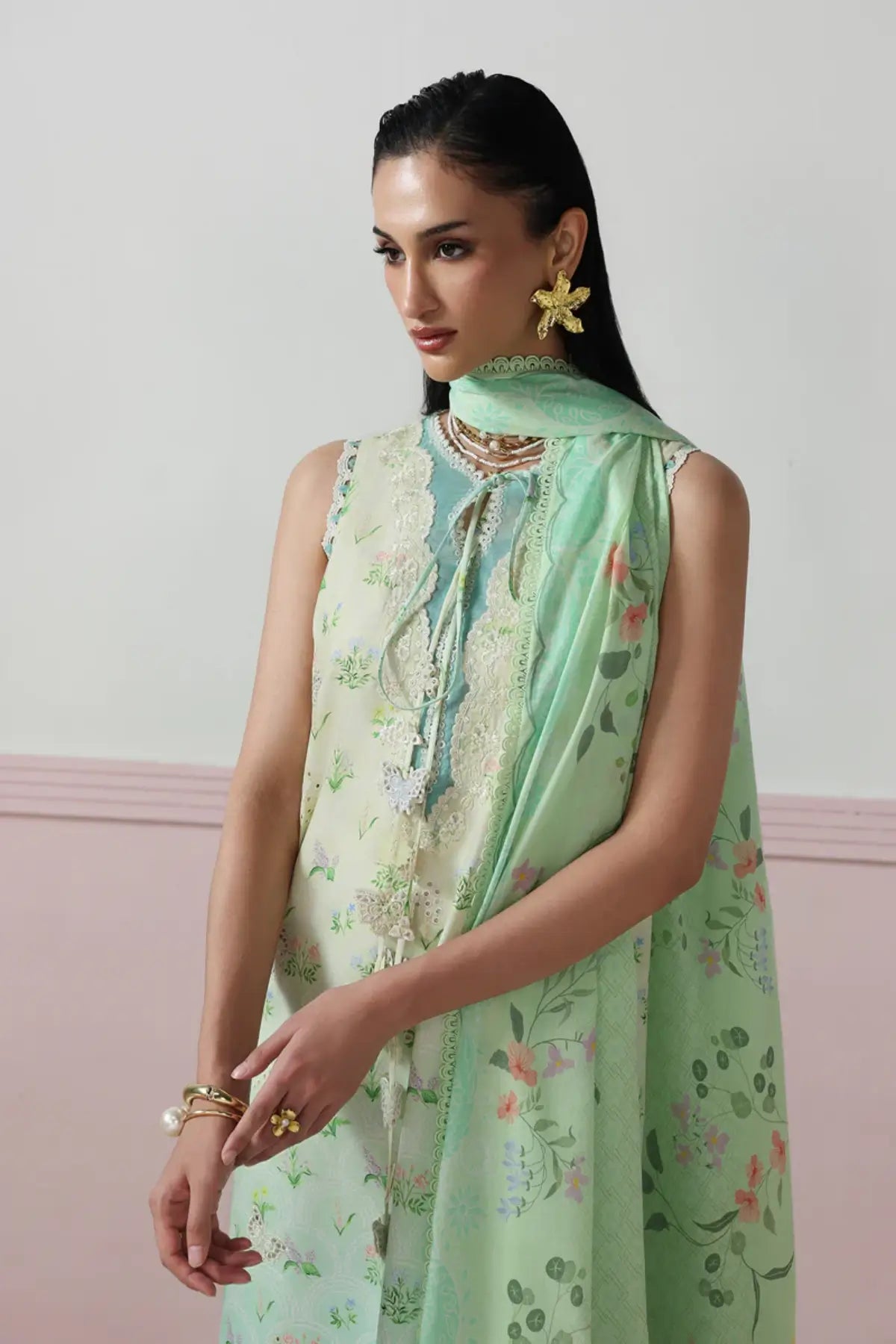 Della QQP-07(B) by Qalamkar mint green lawn stitched 3PC suit with chikankari embroidery, 3D floral detailing, and printed lawn dupatta.