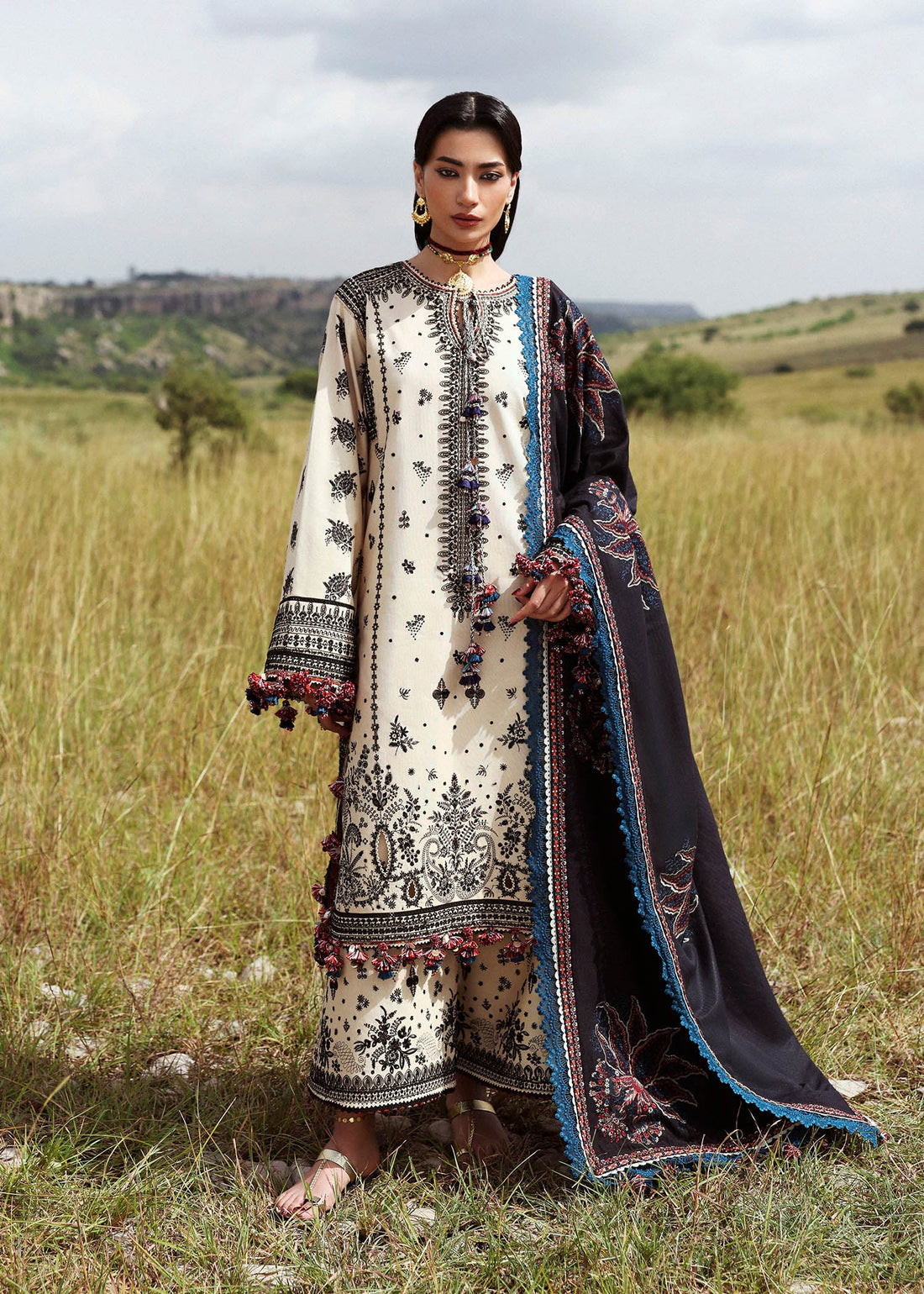 Hussain Rehar Dhanak off-white embroidered khaddar stitched suit with black wool shawl at Pakistanimoda.