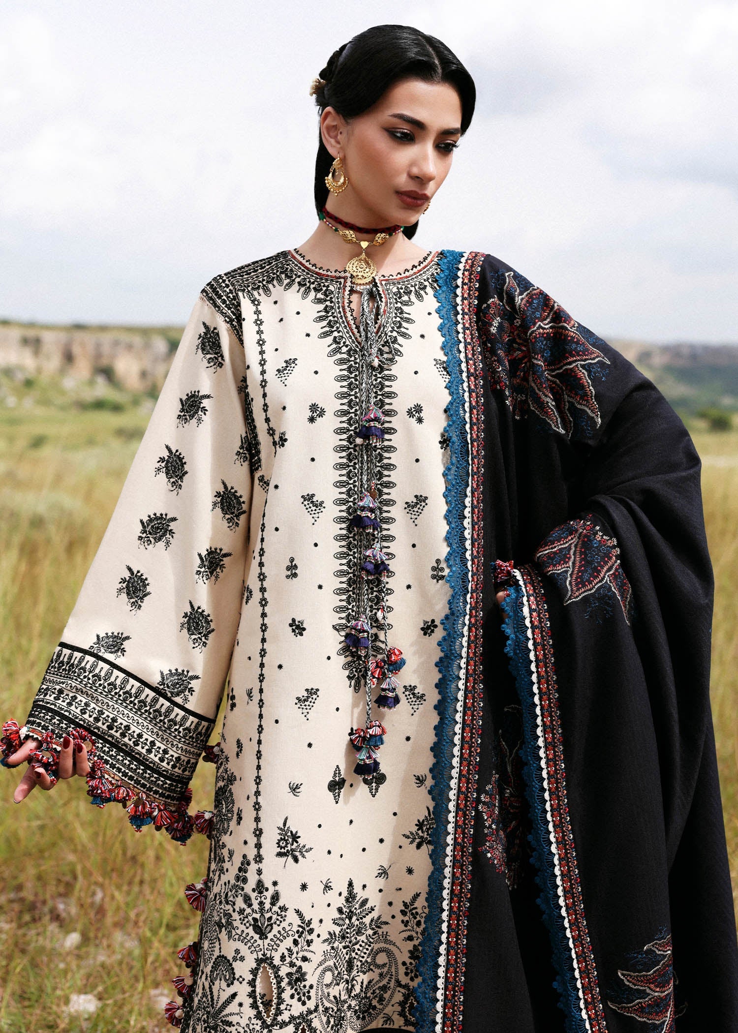Hussain Rehar Dhanak off-white embroidered khaddar stitched suit with black wool shawl at Pakistanimoda.