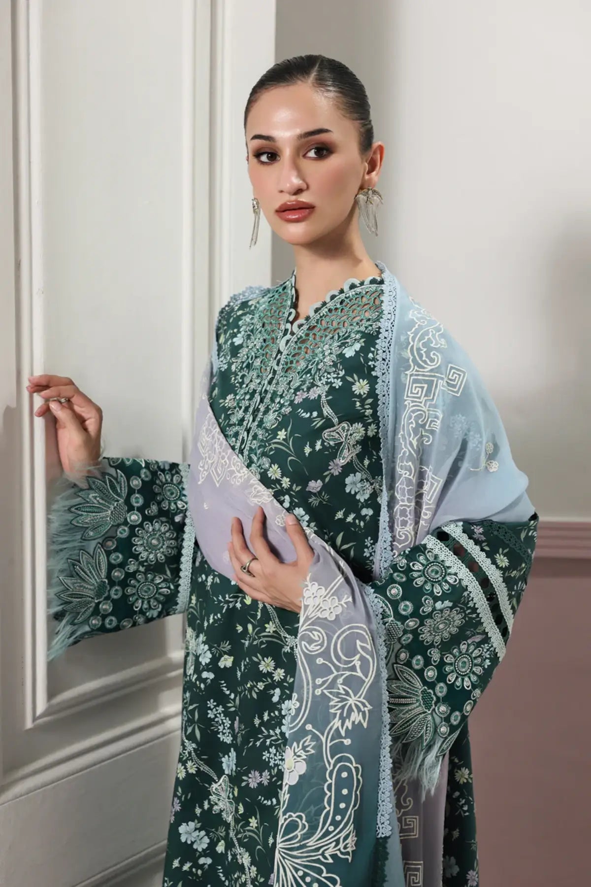 Diane QQP-09(B) by Qalamkar emerald green lawn stitched suit with embroidered front, printed chiffon dupatta, and plain cotton trousers.