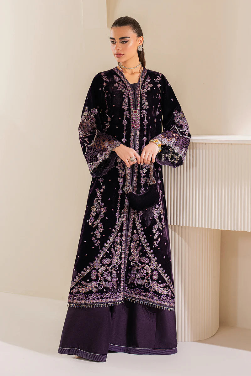 Luxury designer velvet gown with intricate embroidery