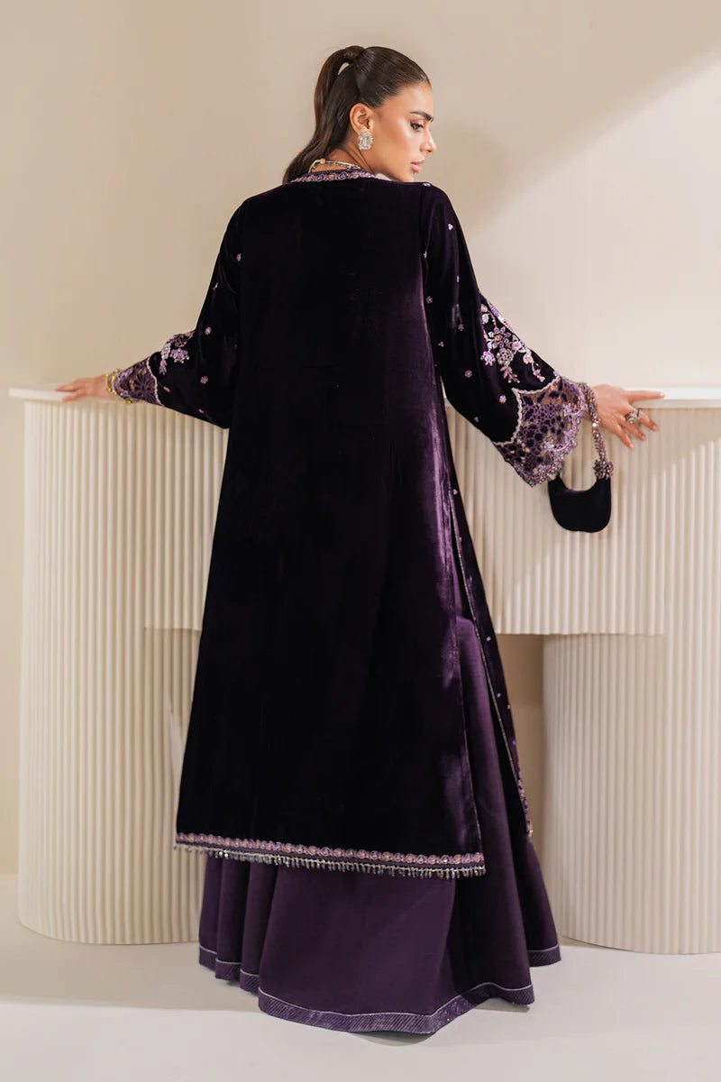 Luxury designer velvet gown with intricate embroidery